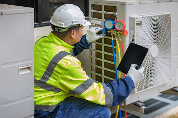 Professional Hvac technician working in Wrightsville Beach, NC